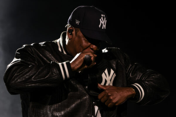 # JAŸ-Z Opens Three-Night Yankee Stadium Run With Surprise Guests and Career-Spanning Set NEW YORK (AP) — JAŸ-Z launched the first of three sold-out performances at Yankee Stadium on Friday night, delivering a career-spanning set that featured surprise appearances from Beyoncé, Blue Ivy Carter, Nas, Alicia Keys, Memphis Bleek, and Jaz-O. The concert marked the opening night of the series, dubbed "JAŸ-Z 30," celebrating the rapper's legacy with a performance that blended early classics, chart-topping hits, and collaborations with longtime friends and family. Beyoncé joined JAŸ-Z to open the show with "Can't Knock the Hustle," the pair's rendition of the 1996 track setting the tone for an evening that revisited much of the Brooklyn native's catalog. JAŸ-Z continued with songs including "Politics as Usual," "Made in America," "Brooklyn's Finest," and "I Love the Dough." Later in the performance, Nas took the stage for a trio of New York hip-hop staples: "Dead Presidents," "The World Is Yours," and "N.Y. State of Mind," before remaining onstage for "Where I'm From." The appearance underscored the longtime relationship between the two rap icons, whose rivalry evolved into one of the genre's most notable reconciliations. Blue Ivy Carter also made an appearance, playing piano to introduce "Feelin It." Alicia Keys later surprised the audience with a performance of "Empire State of Mind," the Grammy-winning anthem that has become synonymous with New York City. Memphis Bleek joined JAŸ-Z for "Coming of Age," while Jaz-O also appeared during the evening. The audience included a wide range of entertainers, athletes, and business leaders. Among those in attendance were LeBron James, Leonardo DiCaprio, Kevin Hart, Adrien Brody, Tobey Maguire, Megan Thee Stallion, Jack Dorsey, DJ Khaled, Swizz Beatz, Jadakiss, La La Anthony, Kelly Rowland, Vanessa Bryant, OG Anunoby, Robinson Canó, Rudy Gay, P.J. Tucker, Fabolous, Sheek Louch, Lukas Haas, and Yan Diomandé. JAŸ-Z also showcased multiple wardrobe changes throughout the night. He opened wearing a Planes baseball cap, a custom CROC baseball jacket designed by June Ambrose, Fear of God trousers, a Planes T-shirt, and his Nike Air Force 1 collaboration sneakers. He later changed into a Givenchy suit layered with a Maison Bootleg piece and Timberland boots before closing the concert in a workwear-inspired ensemble featuring a custom umpire-style proof vest, a striped Japanese denim barn jacket, carpenter pants designed by Ambrose, and Timberland boots. The nearly three-dozen-song set highlighted every stage of JAŸ-Z's career, moving from early recordings such as "Can I Live," "D'evils," "Friend or Foe," and "Regrets" to later releases including "No Church in the Wild" and "Made in America." The celebration continues Saturday with "JAŸ-Z 25" before concluding Sunday with "JAŸ-Z Extra Innings."
