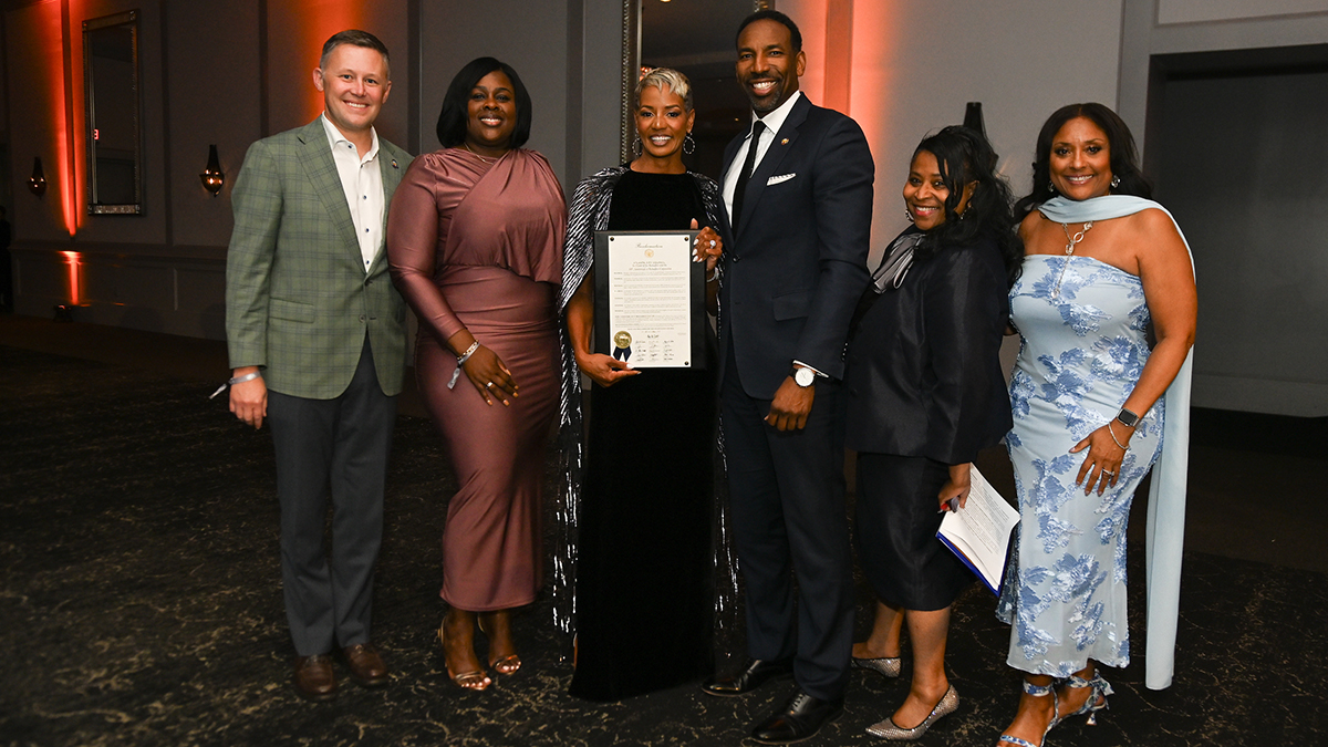 Joy Rohadfox with Mayor Andre Dickens and City Employees